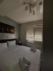 Postel nebo postele na pokoji v ubytování Kengur Resort