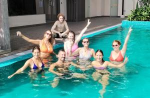 a group of people in a swimming pool at Ringo's Foyer in Melaka