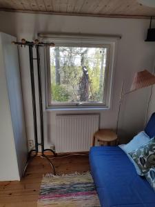 Postel nebo postele na pokoji v ubytování Sköna stugan
