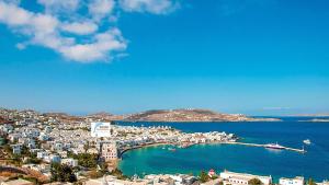 a view of a city with a harbor and the ocean at Pension Ageliki Kalogera in Mikonos