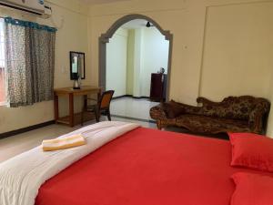 Voodi või voodid majutusasutuse Prakash holliday home toas