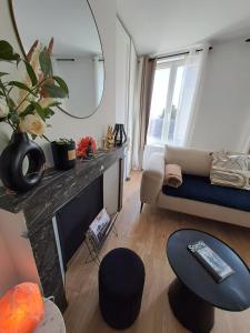 Część wypoczynkowa w obiekcie Appartement de charme Rouen