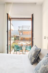 Postel nebo postele na pokoji v ubytování YourHome - Maison degli Aranci