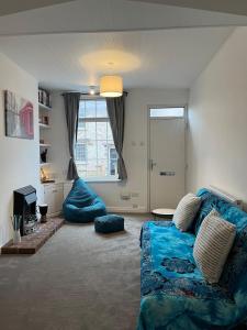 Posezení v ubytování Comfortable Townhouse in Willerby + 31 fotografií