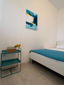 Ein Bett oder Betten in einem Zimmer der Unterkunft Apartments Sunset Dolac