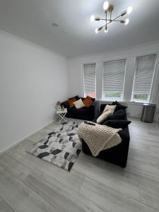 Posezení v ubytování Cozy 3 Bed Home, Free Parking 8 min to City Centre
