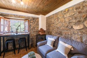 Posezení v ubytování Apartamentos Rurales La Laguna Somiedo