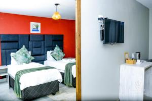 Postel nebo postele na pokoji v ubytování Solovina Guest House