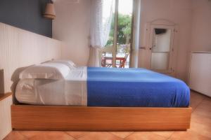 Posteľ alebo postele v izbe v ubytovaní B&B Happy Days Golfo di Gallipoli