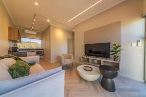 Телевизор и/или развлекательный центр в Cottage 3 - Leo Sky Farm