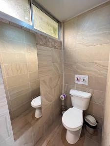 Koupelna v ubytování Apartamentos en el Centro de Puerto Viejo