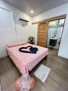 Postel nebo postele na pokoji v ubytování Apartamentos en el Centro de Puerto Viejo + 6 fotografií