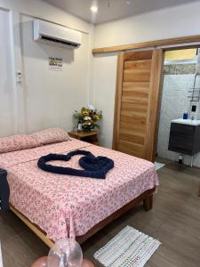 Postel nebo postele na pokoji v ubytování Apartamentos en el Centro de Puerto Viejo