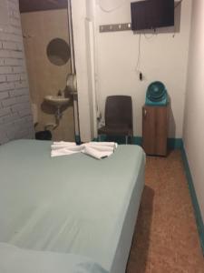 Hotel Pelman客房内的一张或多张床位