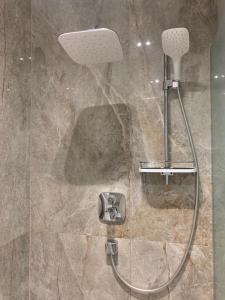 Koupelna v ubytování Butas su terasa + 34 fotografií