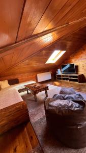 Posezení v ubytování Πασιθεα mountain rooms