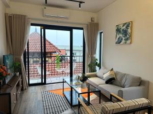 Χώρος καθιστικού στο Luxe Paradise Residence 88 Tu Hoa