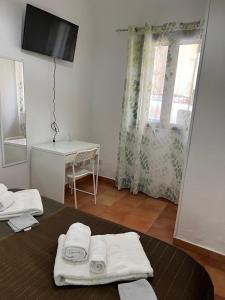 Postel nebo postele na pokoji v ubytování Casa Fico D'India
