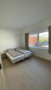 Postel nebo postele na pokoji v ubytování Leiti House