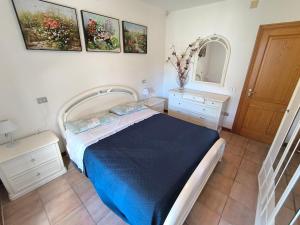Postel nebo postele na pokoji v ubytování Casa Vacanze Bue Marino