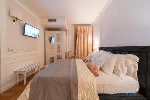 Letto o letti in una camera di Tesoretto Hotel
