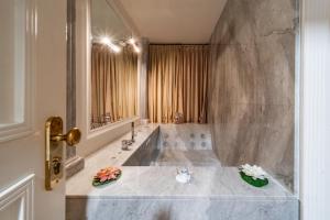 Koupelna v ubytování Tesoretto Hotel