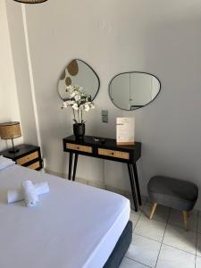 Postel nebo postele na pokoji v ubytování Chrysa House