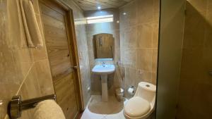 Koupelna v ubytování Hotel Don Andres