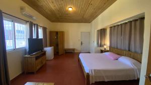 Postel nebo postele na pokoji v ubytování Hotel Don Andres + 15 fotografií