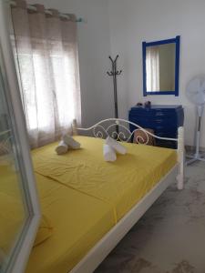 Postel nebo postele na pokoji v ubytování Chalkidiki White Kallithea Apartments