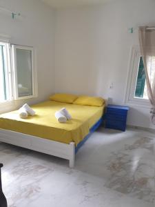 Postel nebo postele na pokoji v ubytování Chalkidiki White Kallithea Apartments