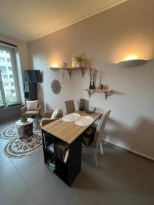 Posezení v ubytování Le Studio du Bosquet