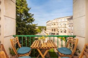 Balkón nebo terasa v ubytování Artistic luxury flat with Colosseum view