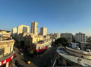 a view of a city with tall buildings at Agora House for men only 仅限男性 in Alexandria