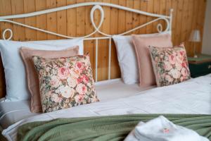 Voodi või voodid majutusasutuse Chalet Grittli toas