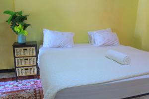 Postel nebo postele na pokoji v ubytování Creg Guest House Rustenburg