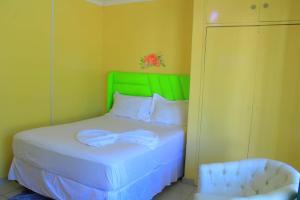 Postel nebo postele na pokoji v ubytování Creg Guest House Rustenburg