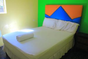 Postel nebo postele na pokoji v ubytování Creg Guest House Rustenburg
