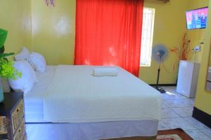 Postel nebo postele na pokoji v ubytování Creg Guest House Rustenburg