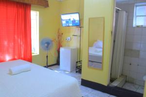 Postel nebo postele na pokoji v ubytování Creg Guest House Rustenburg