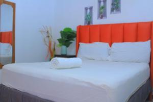 Postel nebo postele na pokoji v ubytování Creg Guest House Rustenburg