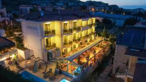 an aerial view of a hotel at night at Venezia Alaçatı in Yumru