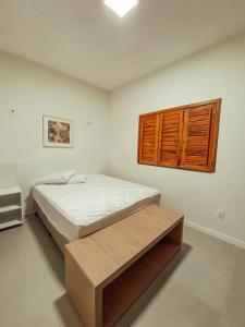 Ένα ή περισσότερα κρεβάτια σε δωμάτιο στο Linda Casa de Praia Família com até 10 pessoas +42 φωτογραφίες