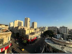 a view of a city with tall buildings at Agora House for men only 仅限男性 in Alexandria
