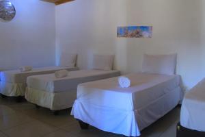Postel nebo postele na pokoji v ubytování Creg Guest House Rustenburg