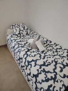 a bed with teddy bears on it in a room at Sologne Escape in Tour-en-Sologne