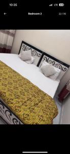 Postel nebo postele na pokoji v ubytování Lovely 2 Bedroom Furnished Apartments
