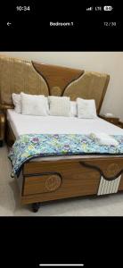 Postel nebo postele na pokoji v ubytování Lovely 2 Bedroom Furnished Apartments