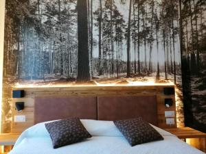 Postel nebo postele na pokoji v ubytování Albergo Silvana