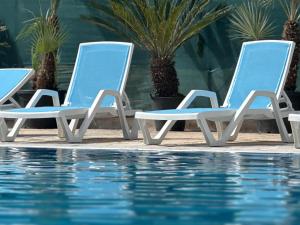 Bazén v ubytování Grand Resort by Greccia Dhermi Prime nebo v jeho okolí